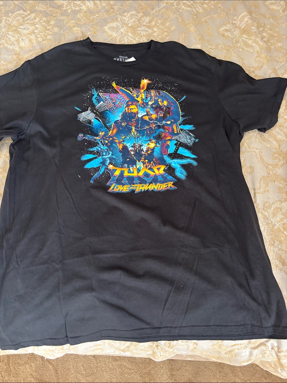 Marvel Black Short Sleeve Tee with Multicolor Love and Thunder Graphic. THOR